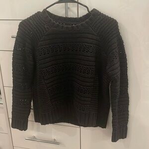 Me to We black crochet sweater with different knit patterns